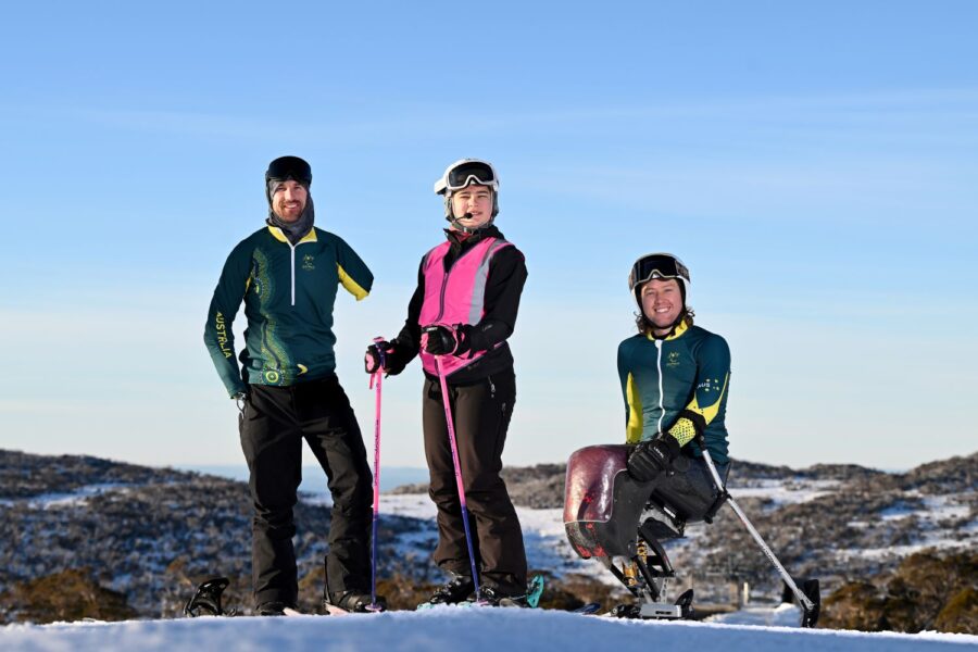 http://Sean%20Pollard,%20Ivy%20Walker%20and%20Josh%20Hanlon%20stand%20on%20top%20of%20a%20mountain%20peak