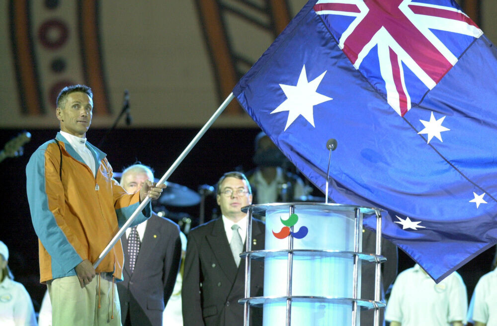 We-Felt-Like-We-Could-Take-On-The-World-Burkett-with-flag-01